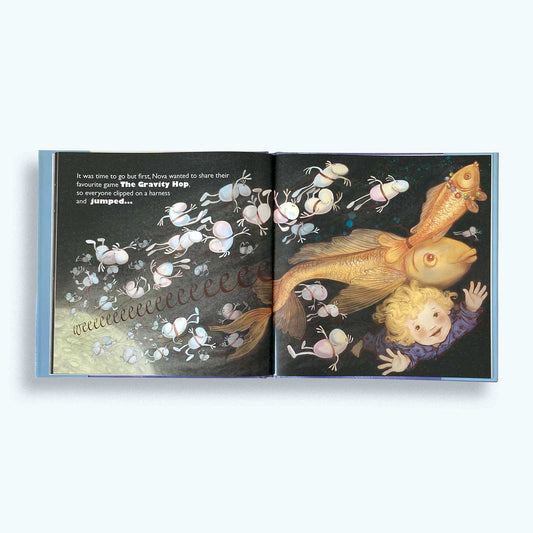 Illustrated book open to two pages with a goldfish and a character called Pearl