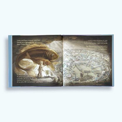 Open book showing illustrations of a giant fish and musical instruments. An orchestra will play in this space. An Orchestra of 'Moon Pearls'.